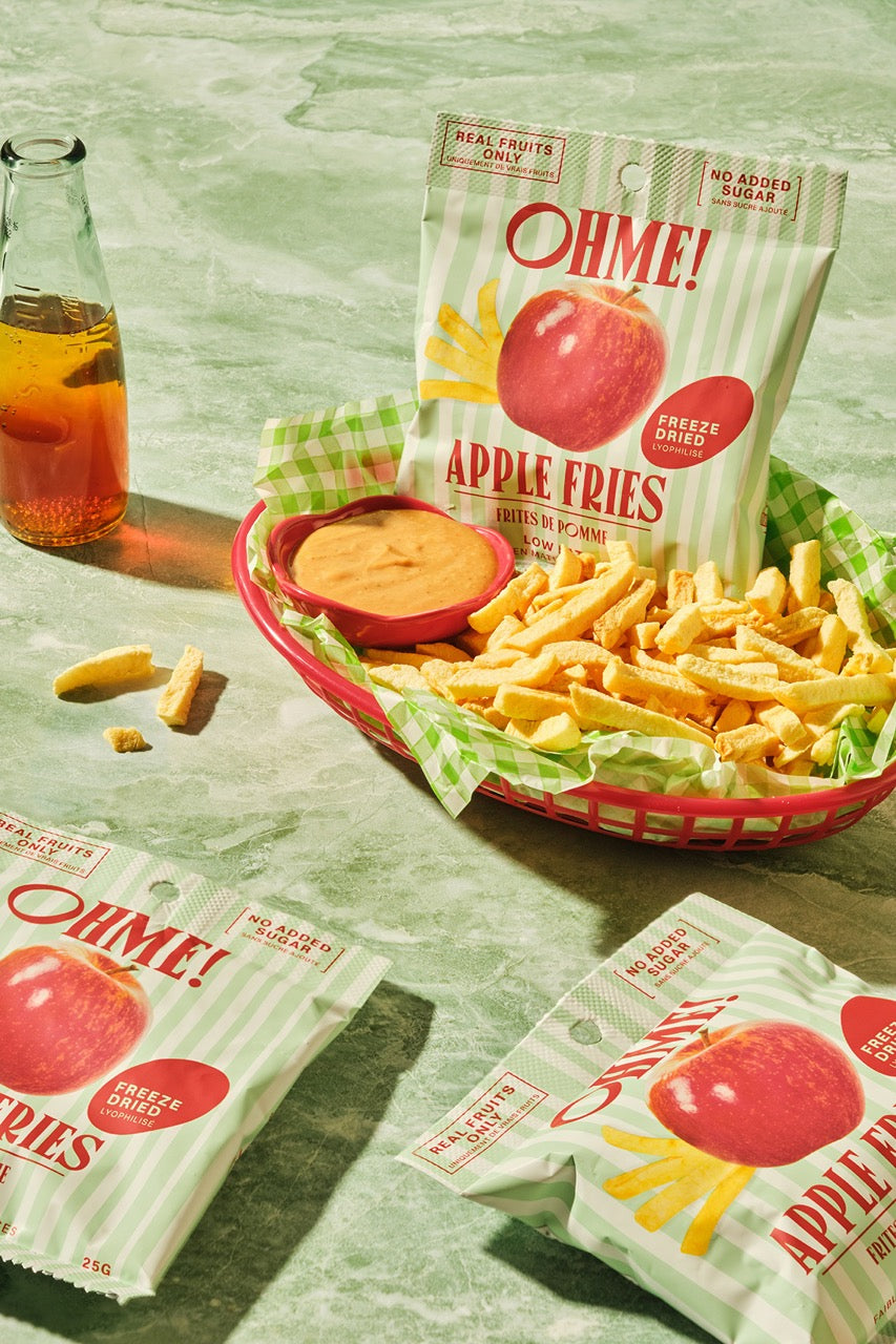 OHME! Apple Fries packaging with fries and dipping sauce on a green surface