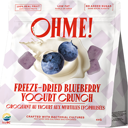 Packaging of OHME! freeze-dried blueberry yogurt crunch with blueberries and yogurt on a geometric patterned background.