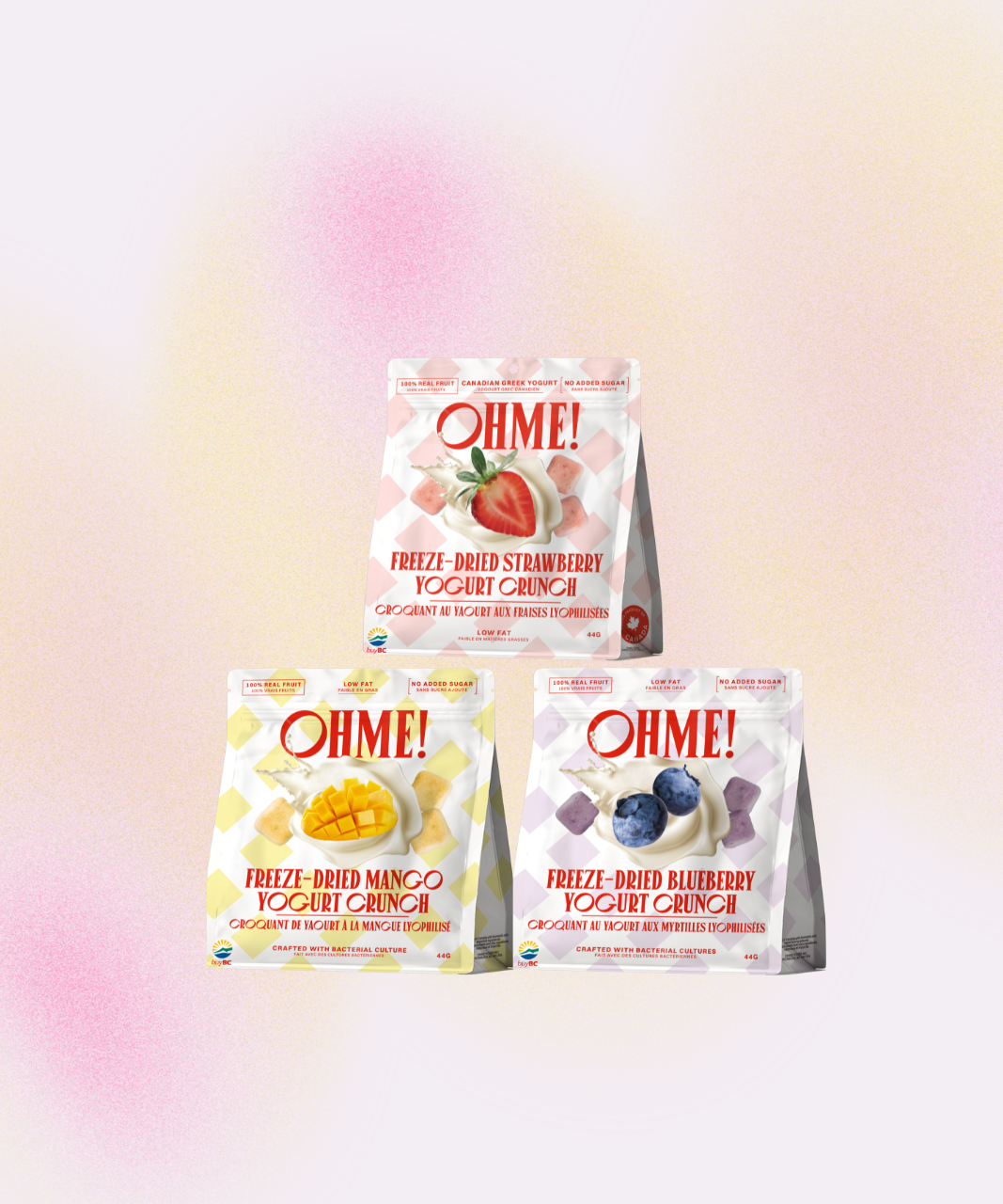 Three packages of Oh-My Yogurt Crunch in freeze-dried strawberry, mango, and blueberry flavors, against a white background.
