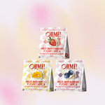 Three packages of Oh-My Yogurt Crunch in freeze-dried strawberry, mango, and blueberry flavors, against a white background.