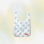 Reusable bag with blue and white checkered pattern on a gradient background