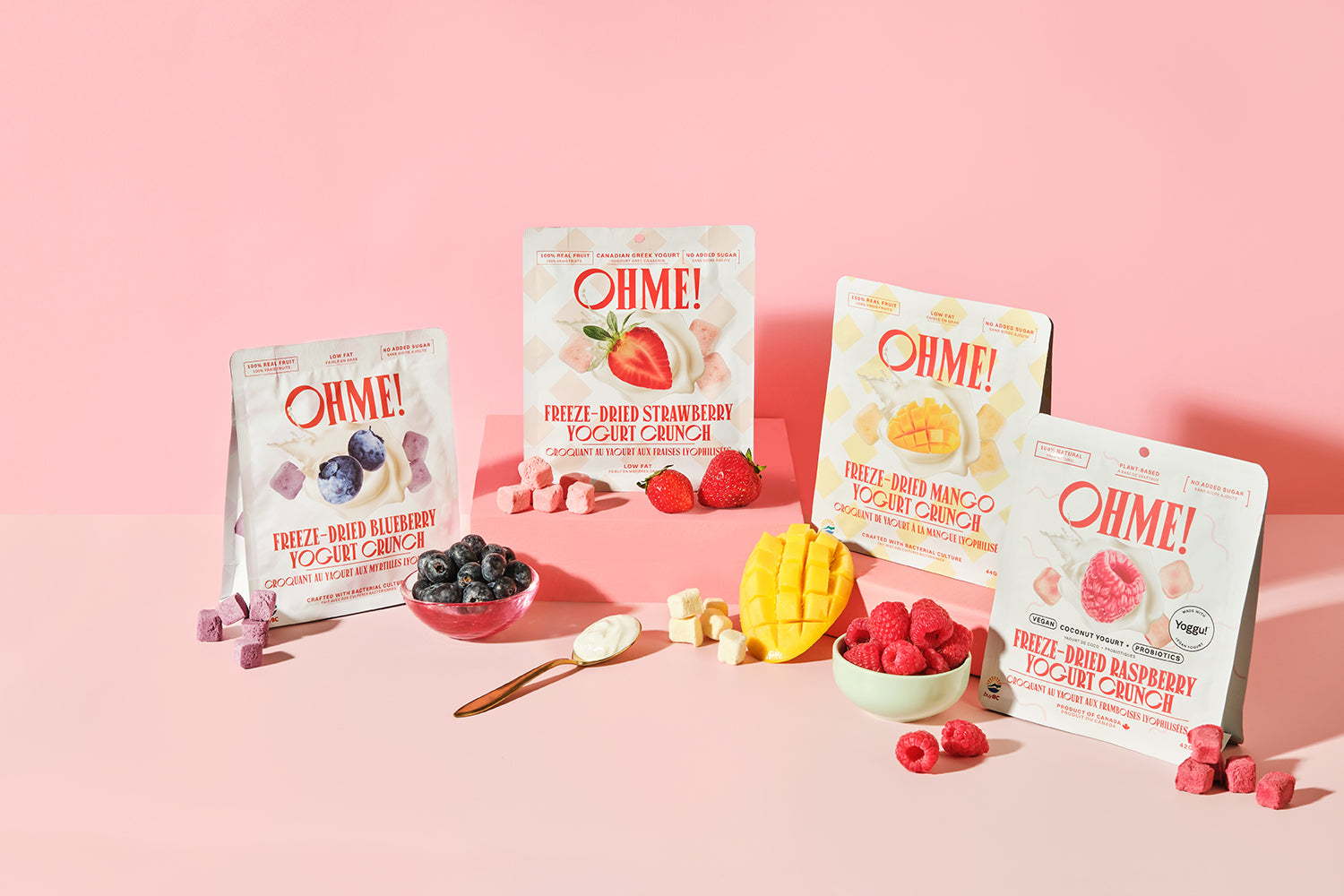 OHME! fruit and veggie snacks on a pink background